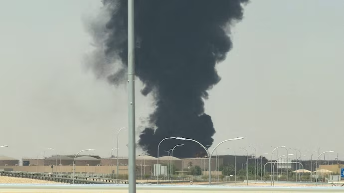 Large plume of black smoke rises from the fuel storage area at King Khalid International Airport, in Riyadh,